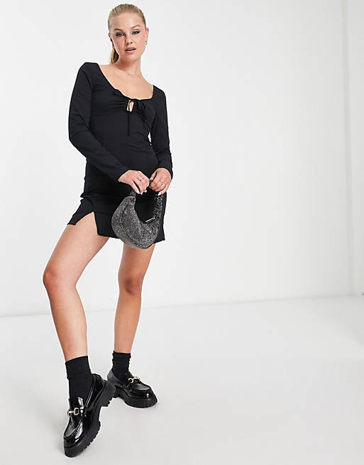 fitted long-sleeved mini dress with lace-up collar
