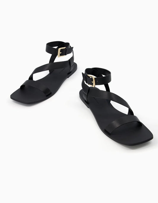 Flat sandals with ankle strap